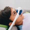 What types of sedation are available for cosmetic dental procedures?